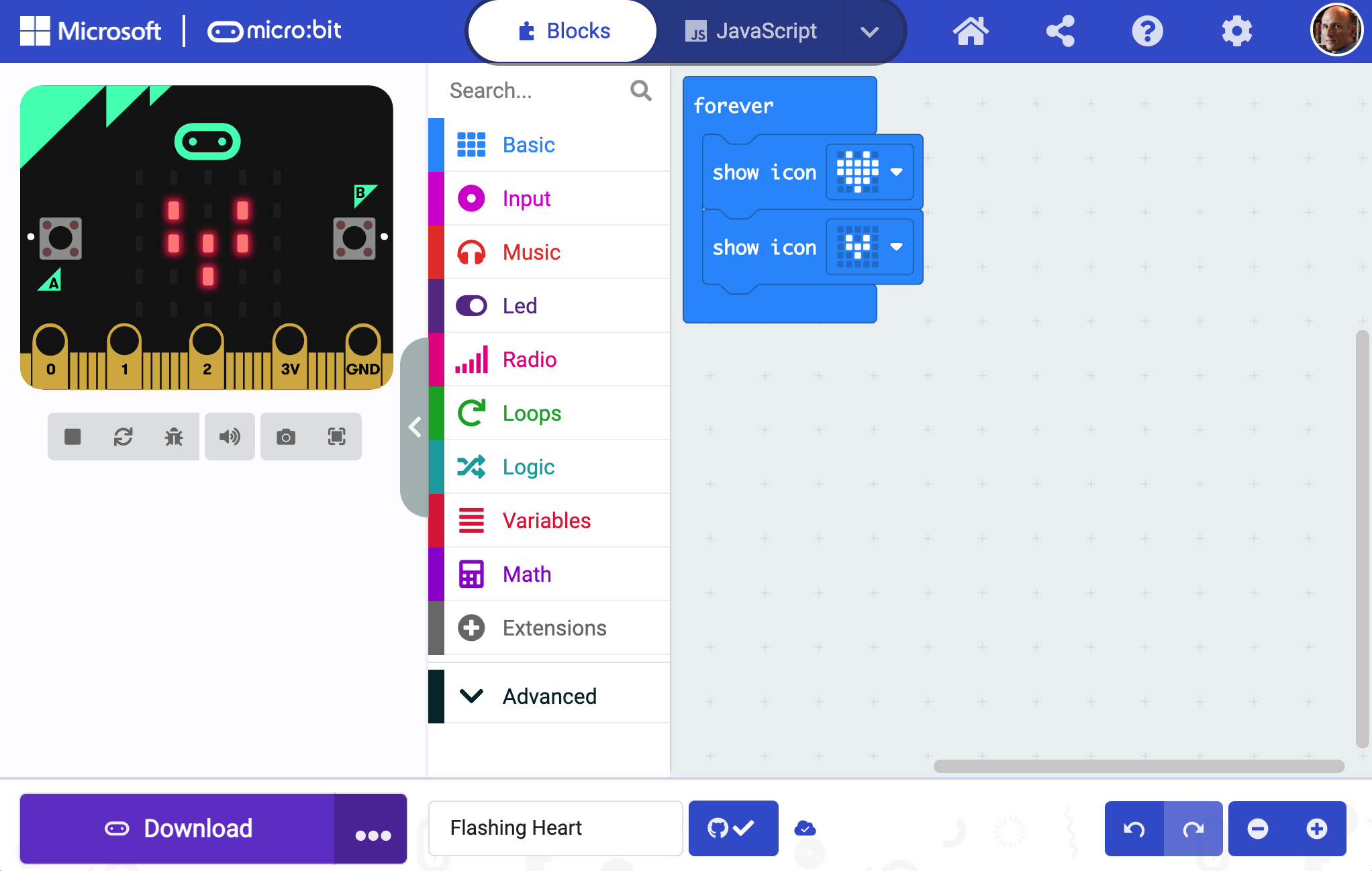 MakeCode editor with flashing heart program